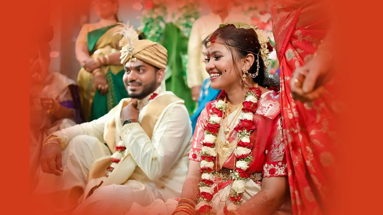 Bride and groom smiling during the varmala ceremony